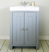 Bathroom vanity cabinet with an Overlay Sink top and traditional tap, painted in Plumbago.