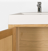 A 1200mm bathroom cabinet in solid oak with double overlay sink and contemporary taps (single adjustable shelf included).